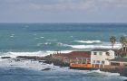 Jeju island, South korea - December 6th, 2013 : The guest house and cafe by seaside in Jeju island presents dynamic view depend on weather
